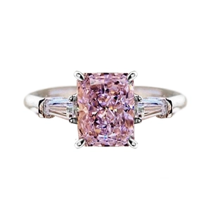 Square pink zircon ring with radiant cut center stone and trapezoid side diamonds