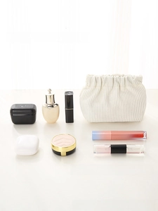 Mini corduroy cosmetic pouch for lipstick and makeup essentials in cream white