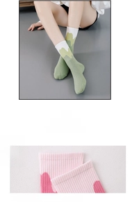 Detail showing elastic non-slip cuffs of gradient crew socks with ribbed knit texture