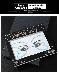 Detailed view of blue butterfly resin face gems on original packaging with back adhesive