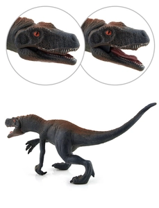 Detailed view of realistic dinosaur toy with movable jaw and textured scales