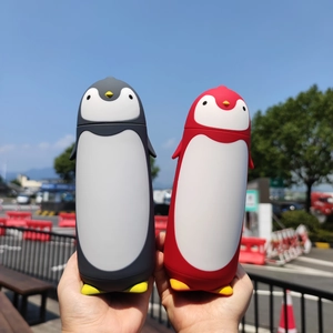 Cute penguin-shaped stainless steel vacuum insulated water bottles in grey and red colors