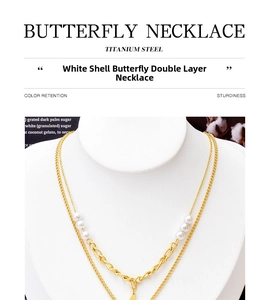 Detail view of double-layer titanium steel necklace with white shell butterfly and pearls