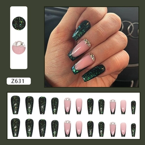 Sparkly emerald green long coffin press-on nails with glitter and rhinestone french tips