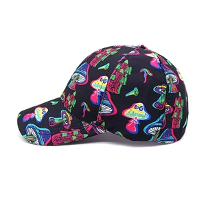 Detail of colorful magic mushroom pattern on a high-quality black cotton baseball cap