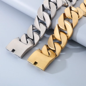 Polished gold and silver Cuban link necklaces with chunky interlocking metal chains