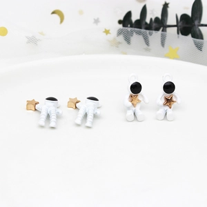 DIY astronaut pendants in white and gold finish for creative jewelry making