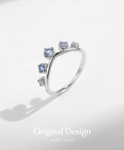 Detailed close-up of a 925 sterling silver crown ring with five colorful zircons
