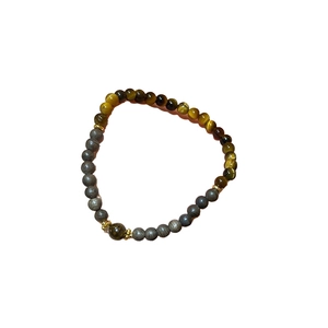 Elegant beaded bracelet with yellow tiger eye, wood-grain beads and golden accents