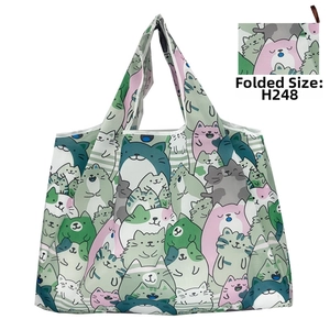 Foldable cat print shopping bag showing compact folded state and wide handles