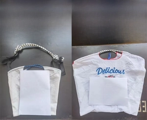 Size comparison of M and L nylon tote bags shown next to A4 paper for scale
