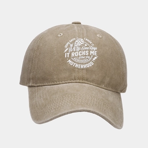 Detail of vintage washed khaki baseball cap with rock mother skull graphic print