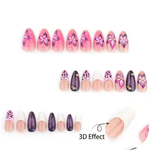 3D floral press-on nails with pink leopard print and white French tips stiletto shape