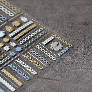 5D embossed nail stickers featuring blue and white sweater knit textures and relief patterns