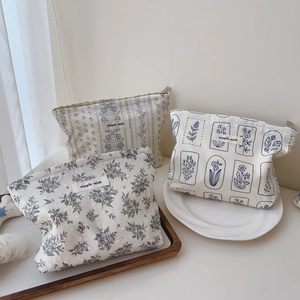 Minimalist floral cotton makeup bags set with blue prints and secure zipper closure