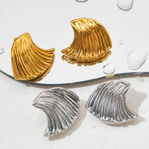Fashionable wave texture shell earrings in gold and silver finish with metallic gloss