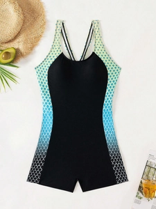 Detail of athletic one-piece swimsuit featuring fish scale pattern and cross-back straps