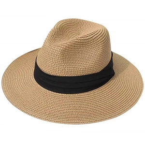 Close-up of the fine woven texture and black ribbon detail on this straw sun hat