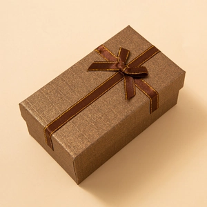 Elegant rectangle gift box with brown brushed texture and a matching satin ribbon bow