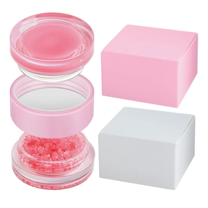 Hydrating lip scrub and balm set in a dual-layer pink container with original packaging box