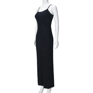 Detail shot of black bodycon maxi dress with shimmering sequins and slim straps