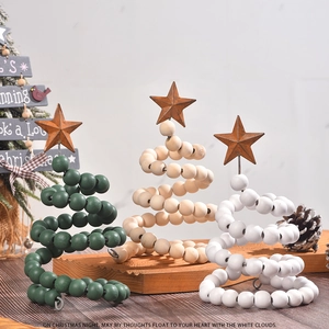 Detail of Nordic wooden spiral Christmas tree ornaments with iron star toppers