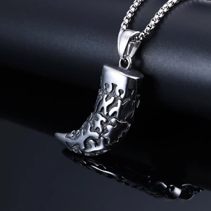 Gothic hollow wolf tooth pendant in stainless steel with a vintage engraved box chain