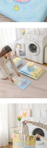 Detail of cartoon mesh laundry bag with summer prints and durable zipper closure