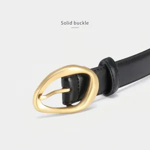 Women's black cowhide leather belt with artistic gold alloy buckle for jeans