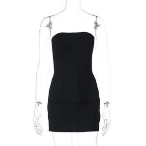 Detail of a black strapless mini dress with layered waist design on a clear mannequin