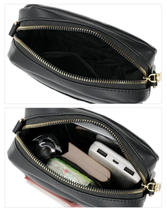 Internal storage capacity of black quilted crossbody bag with golden zipper detail