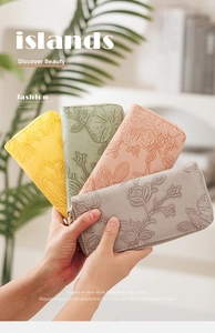 Detail of multi-color long wallets with high-quality floral embossing and zipper