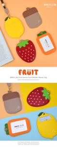 Detailed view of PU leather fruit-shaped card holders including lemon and strawberry designs