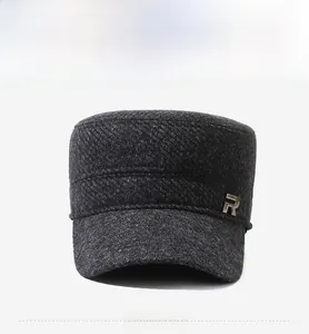 Front view of men's dark gray flat top military cap with metal R logo and wool texture
