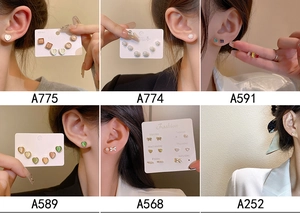 Detailed grid of S925 silver stud earring sets featuring pearls and zircon designs