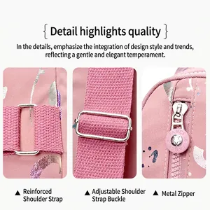 Pink trendy crossbody bag with adjustable metal buckle and star logo zipper details