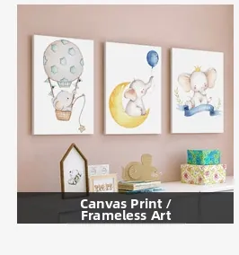 Macro view of unframed bohemian canvas prints featuring cartoon elephant and moon themes
