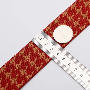 3.8cm wide red houndstooth woven shoulder strap with adjustable jacquard pattern