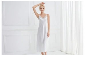 Detailed view of white V-neck satin nightgown with elegant lace trim and smooth finish