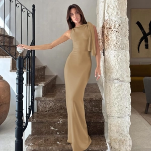 Detail of one-shoulder khaki maxi dress with ribbon showing the sleek neck design