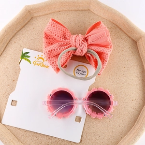 Pink daisy sunglasses and lace bow headband set for toddlers aged 0-4 years