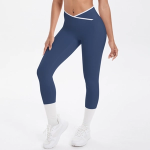 Legging de yoga bleu foncé à taille haute et ceinture croisée en V pour fitness et sport