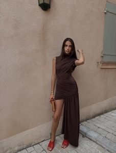 Detail of chocolate brown asymmetric hem dress with elegant pleats and ruched finish