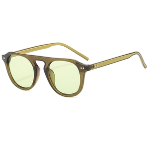 Retro olive green translucent sunglasses with light yellow lenses and metal rivet details