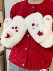 Detailed plush texture of white snowman mittens with red mini hats and soft fur