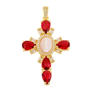 Detail of gold cross pendant featuring red zircons and Mother of Mary shell cameo inlay