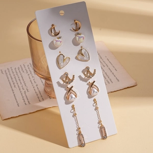 Set of 6 pairs of gold-colored resin geometric stud earrings with pearls and crystals