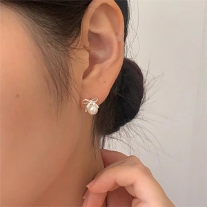 Elegant 925 sterling silver bow knot stud earrings with round white pearls for women