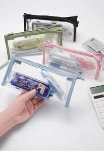Detail view of large capacity transparent PVC pencil cases in four pastel colors with zippers