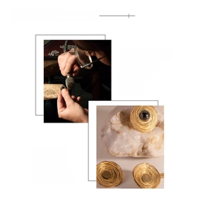 Detail of 18K gold-plated vintage spiral earrings with black onyx inlay craftsmanship